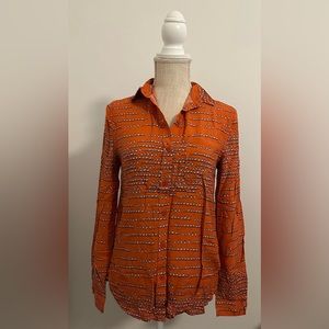 New with Tags. Women’s blouse, Size XS. Heart detail. red-orange color